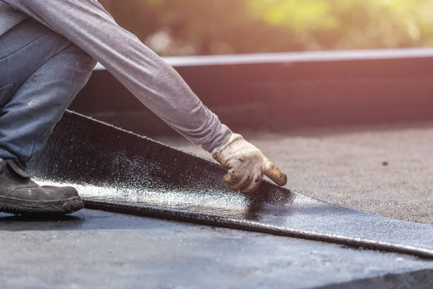 Professional Waterproofing technician working in Lake Bluff, IL